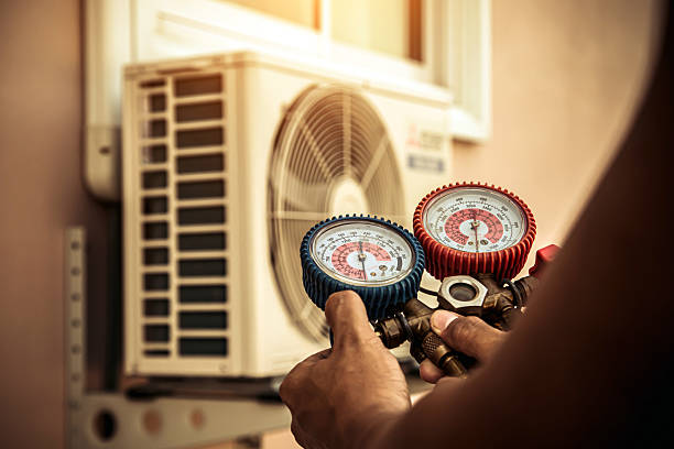 Professional Air Conditioning Service technician working in Skaneateles, NY